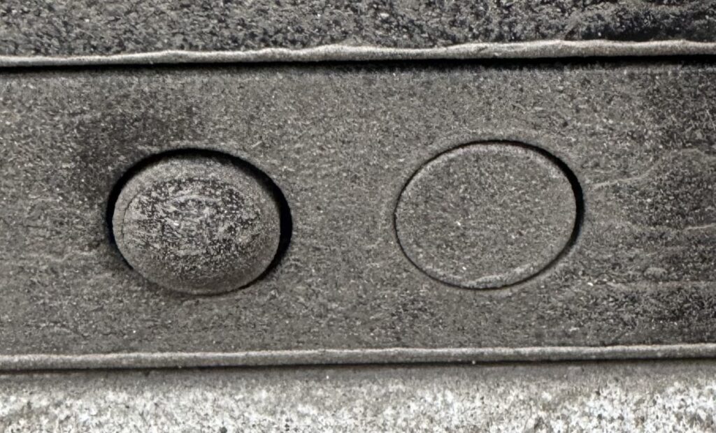 Picture of rear view camera from Polestar, which has some dirt contamination on it